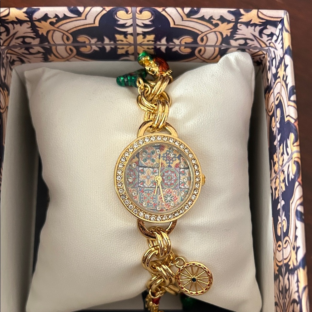 Elegant Gold tone Women's Watch with Crystal Accents and Charms
